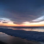 Máncora Beach Sunset – Romantic Peru Honeymoon Escape Golden sunset over Máncora Beach, perfect for a romantic Peru honeymoon getaway.