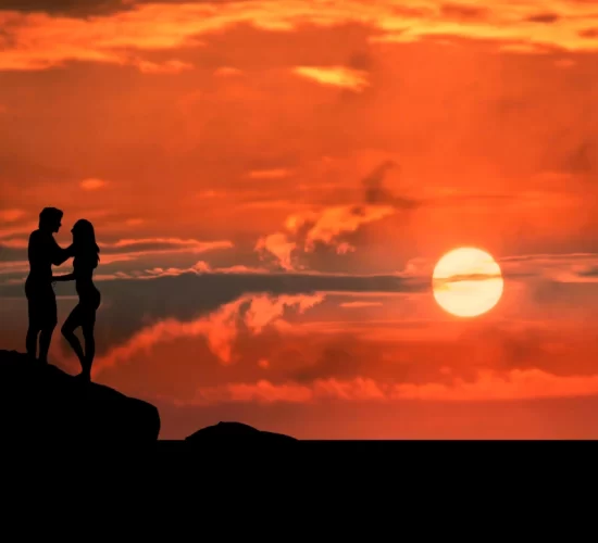 Romantic couple taking a photo at sunset on a Romantic Getaways in Northern Peru