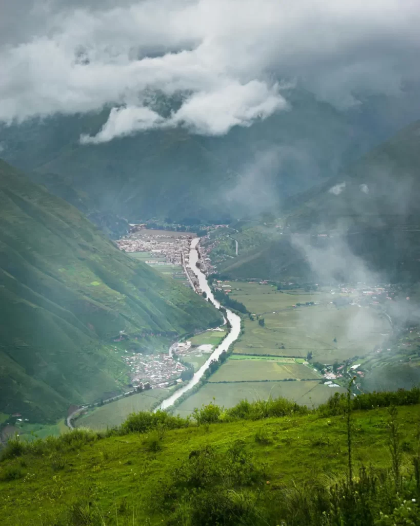 sacred valley panoramic view romantic destinations in peru Panoramic view of the Sacred Valley with green terraces, mountains, and the Urubamba River — one of the most romantic destinations in Peru.