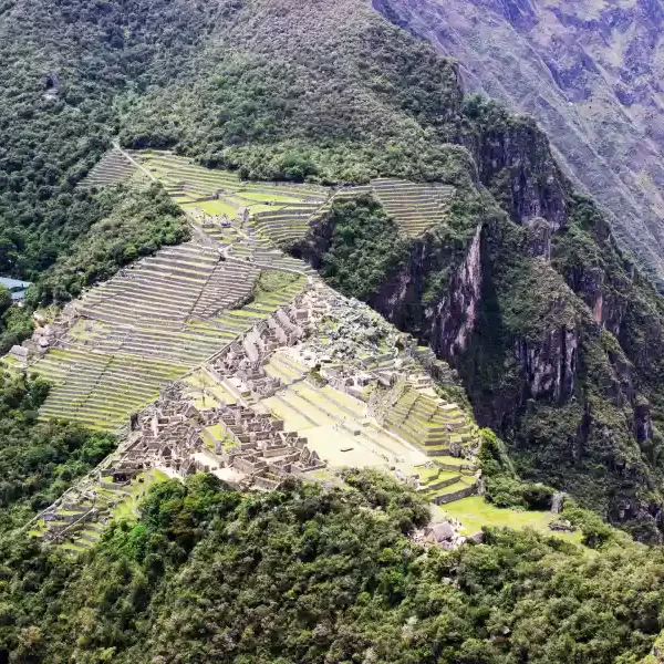 Luxury glamping Inca Trail honeymoon with panoramic aerial view of Machu Picchu surrounded by the Andes