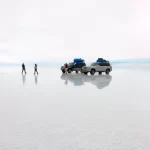 Luxury honeymoon in Peru and Bolivia at the Uyuni Salt Flats, surrounded by endless white landscapes