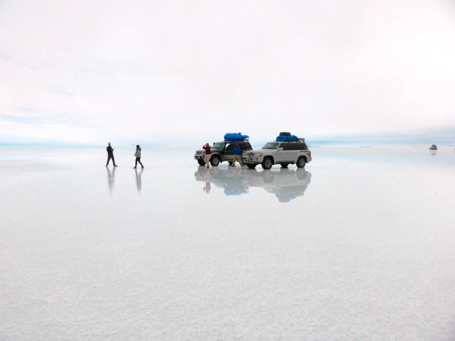 Luxury honeymoon in Peru and Bolivia at the Uyuni Salt Flats, surrounded by endless white landscapes