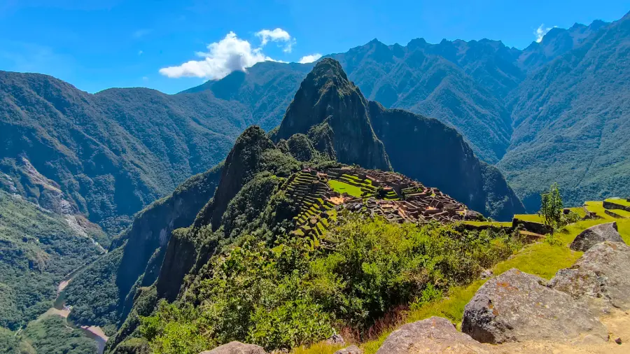 Panoramic view of Machu Picchu surrounded by the Andean mountains